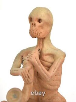 Vintage Studio Pottery Skeleton Playing Horned Instrument Candlestick