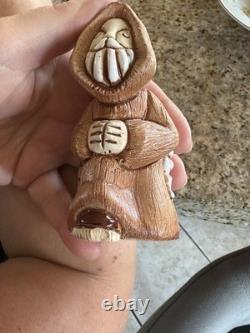 Vintage Uruguay studio pottery figurine With A Kneeling Monk In Prayer & Wine