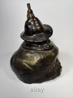Vintage brutalist studio pottery seated Asian monk with pointed hat signed