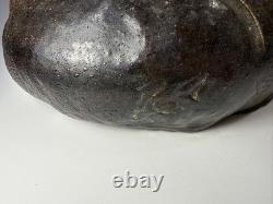 Vintage brutalist studio pottery seated Asian monk with pointed hat signed