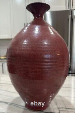 Vintage studio pottery vase. Beautifully done in a drip glaze