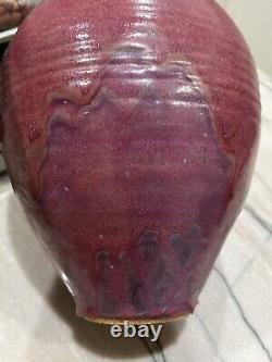 Vintage studio pottery vase. Beautifully done in a drip glaze